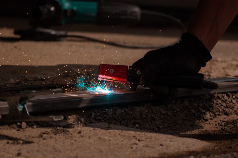 Close-up of welding with sparks and glowing metal