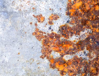 Rust and corrosion on a weathered metal surface
