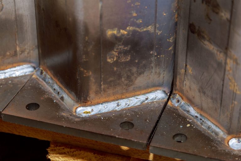 Close-up of a rusty welded metal seam