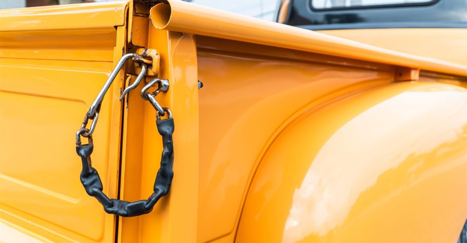 Pickup truck bed with a heavy security chain