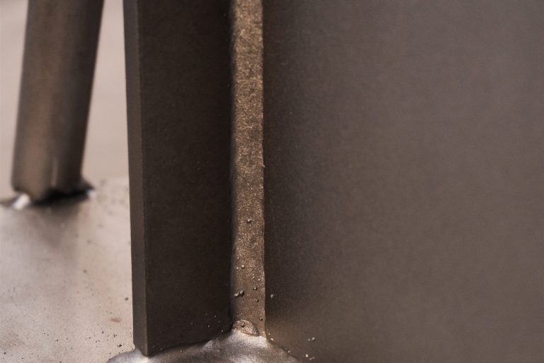 Close-up of a weld bead along a steel joint