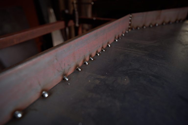 Close-up of a weld joining two steel plates