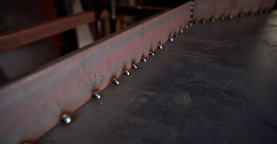 Close-up of a weld joining two steel plates